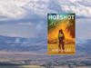 The book cover of Hotshot: A Life on Fire by River Selby, showing a person in a hard hat holding a axe-like tool in front of a burning fire.